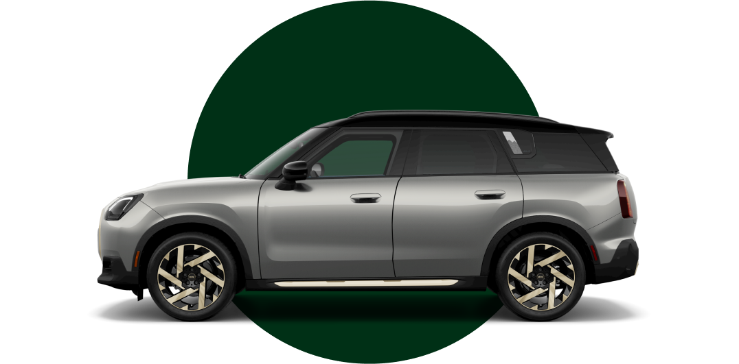 Side view of a 2025 MINI Countryman SE ALL4 in the Melting Silver III body color, facing left with its shadow underneath it.