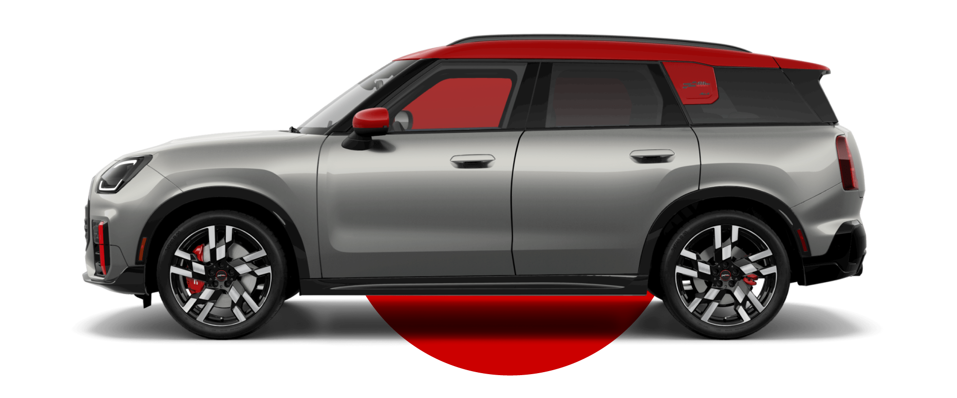 Side view of a MINI JCW Countryman ALL4 in the Melting Silver III body color, facing left with its shadow underneath it.