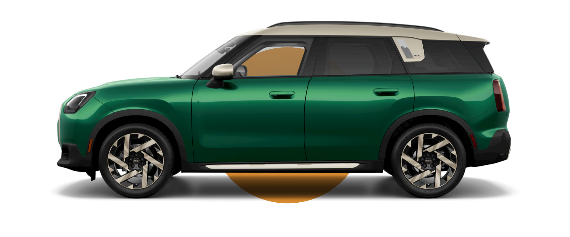 Side view of a MINI Countryman S ALL4 in the British Racing Green body color, facing left with its shadow underneath it.