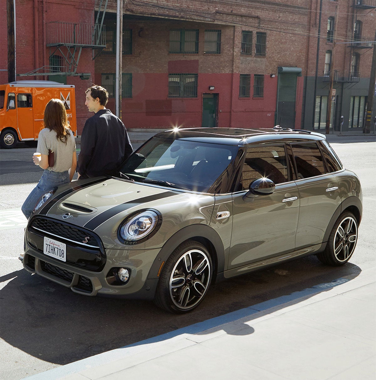 couple standing at brand-mini