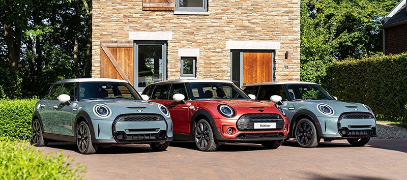 Three brand-mini parked