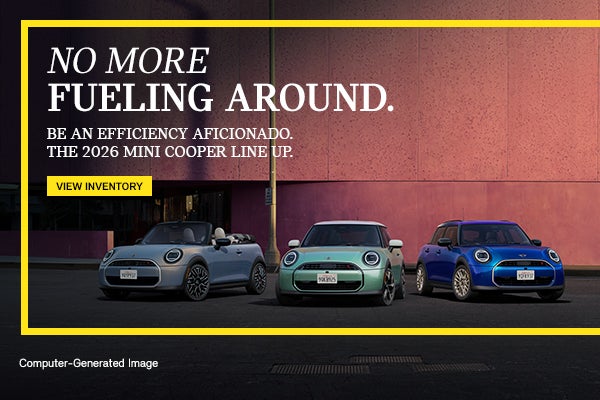 MINI fleet in front of pink wall